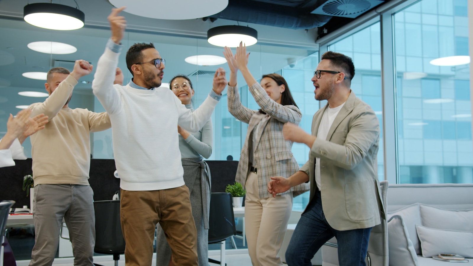 Leaders collaborating on team strategy in a meeting room