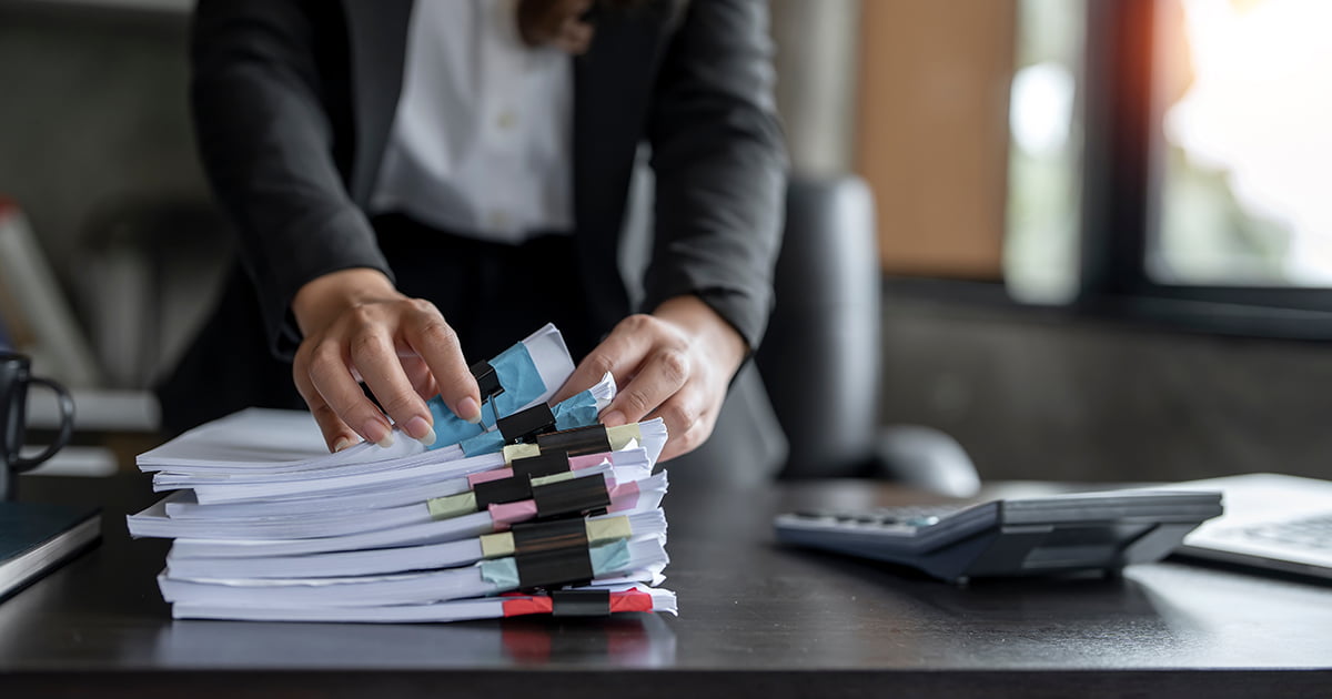 Workplace team preparing investigation notes and process steps